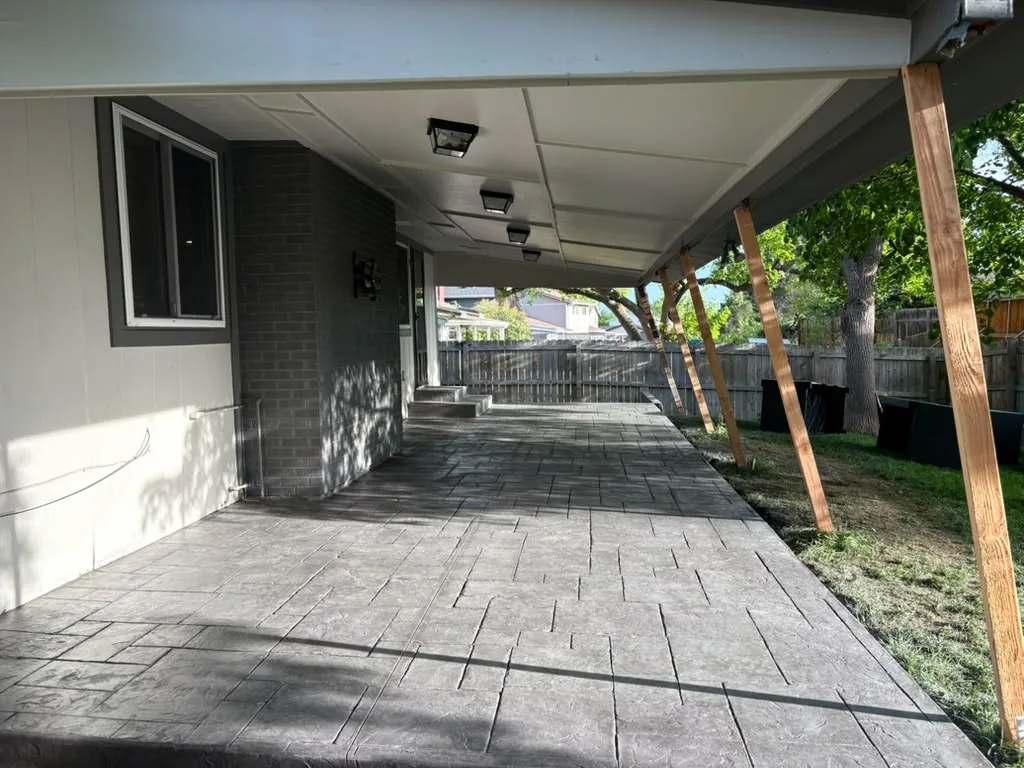 Stamped concrete covered patio with slate pattern